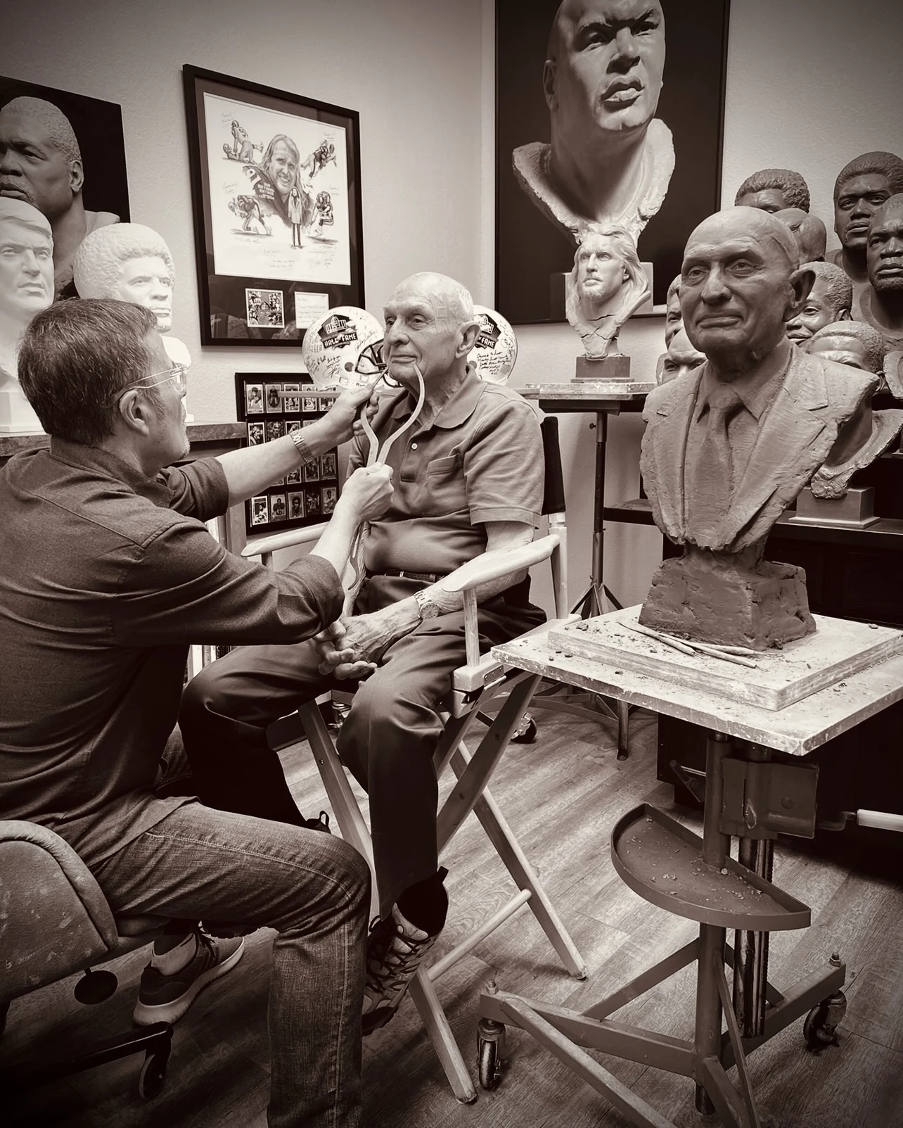 Scott Myers sculpting Dr. Rogers Coleman in the studio