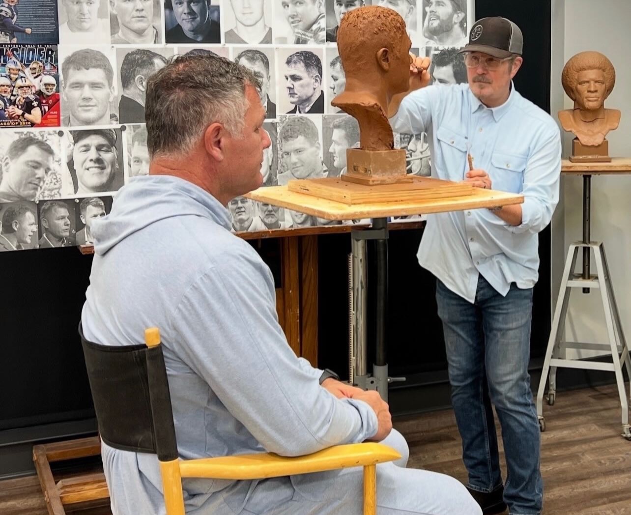 Scott Myers sculpting a portrait bust in the studio