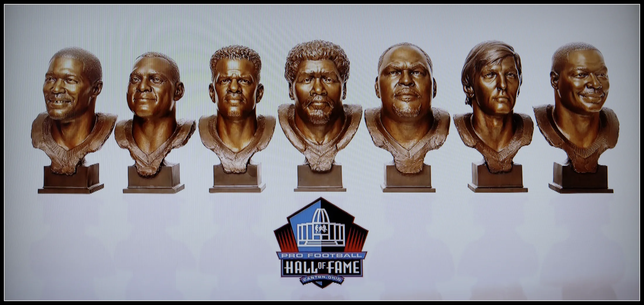 Claude Humphrey among Pro Football Hall of Fame portrait busts by Scott Myers