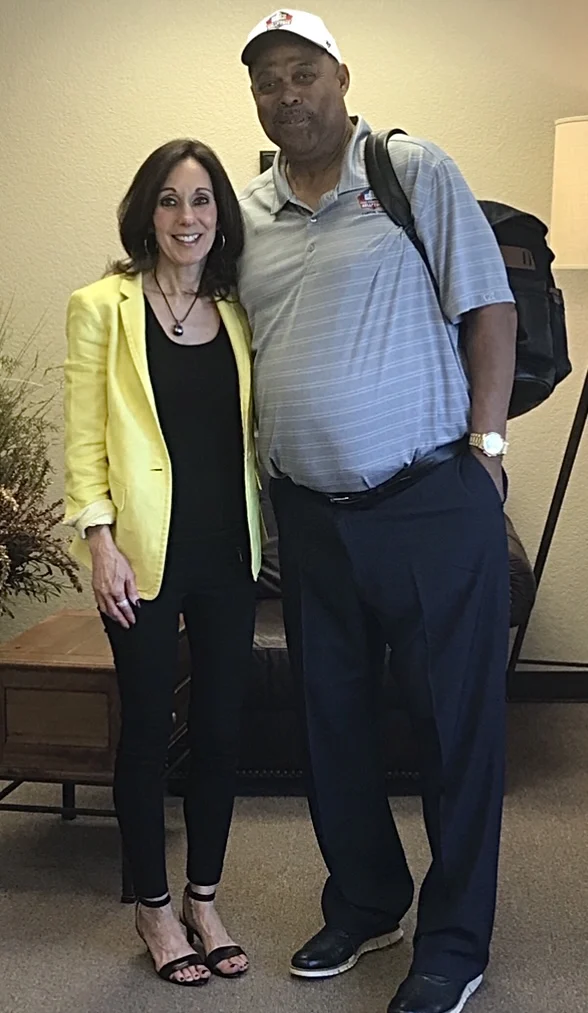 Robert Brazile standing with Kathi Myers