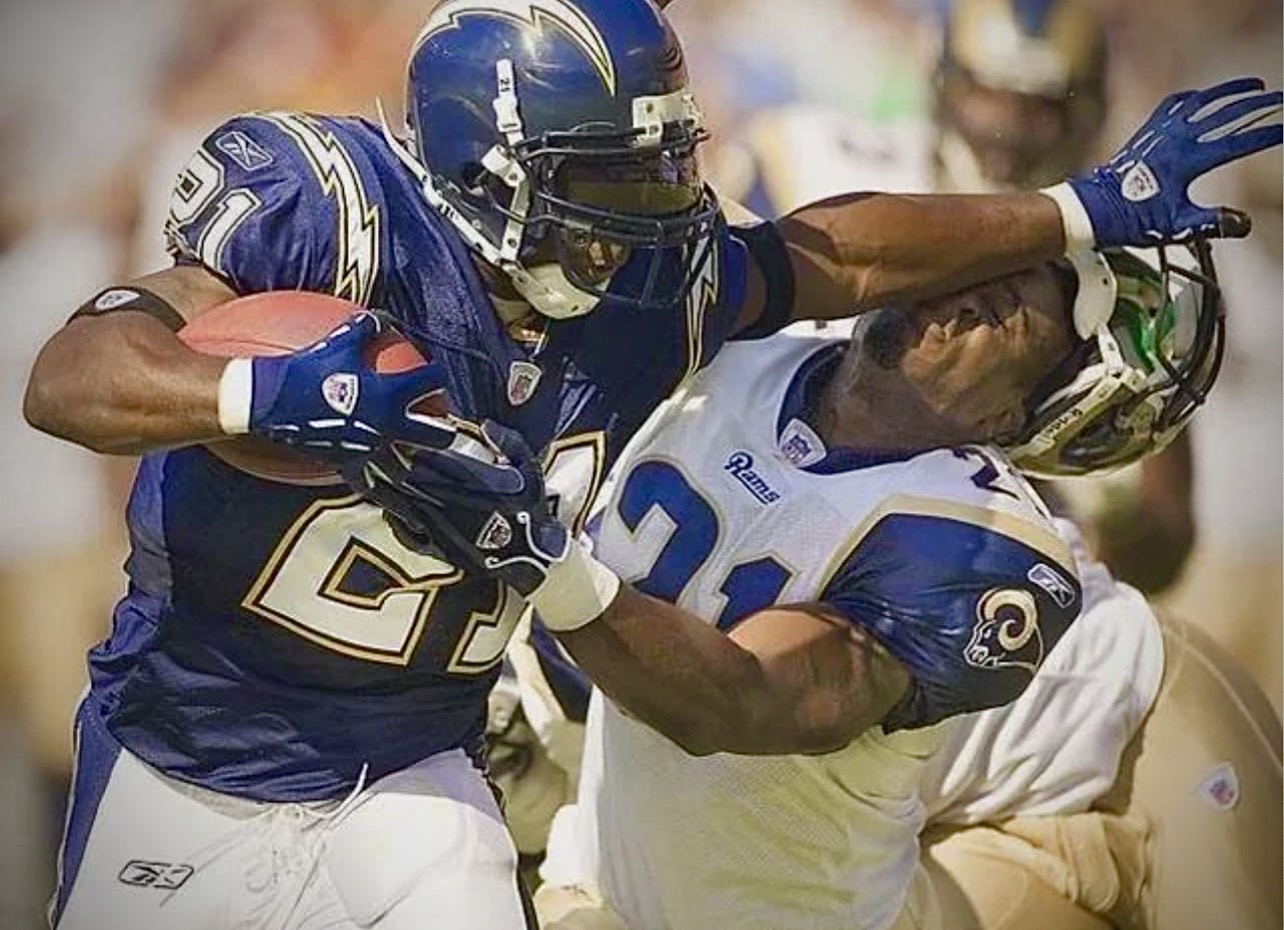 LaDainian Tomlinson carrying the football against the St. Louis Rams
