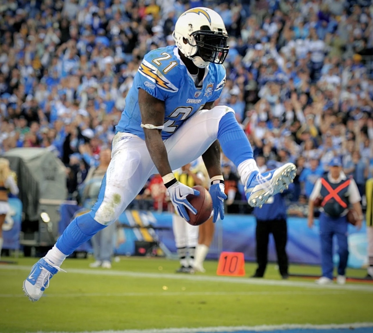 LaDainian Tomlinson leaping with the football for the San Diego Chargers