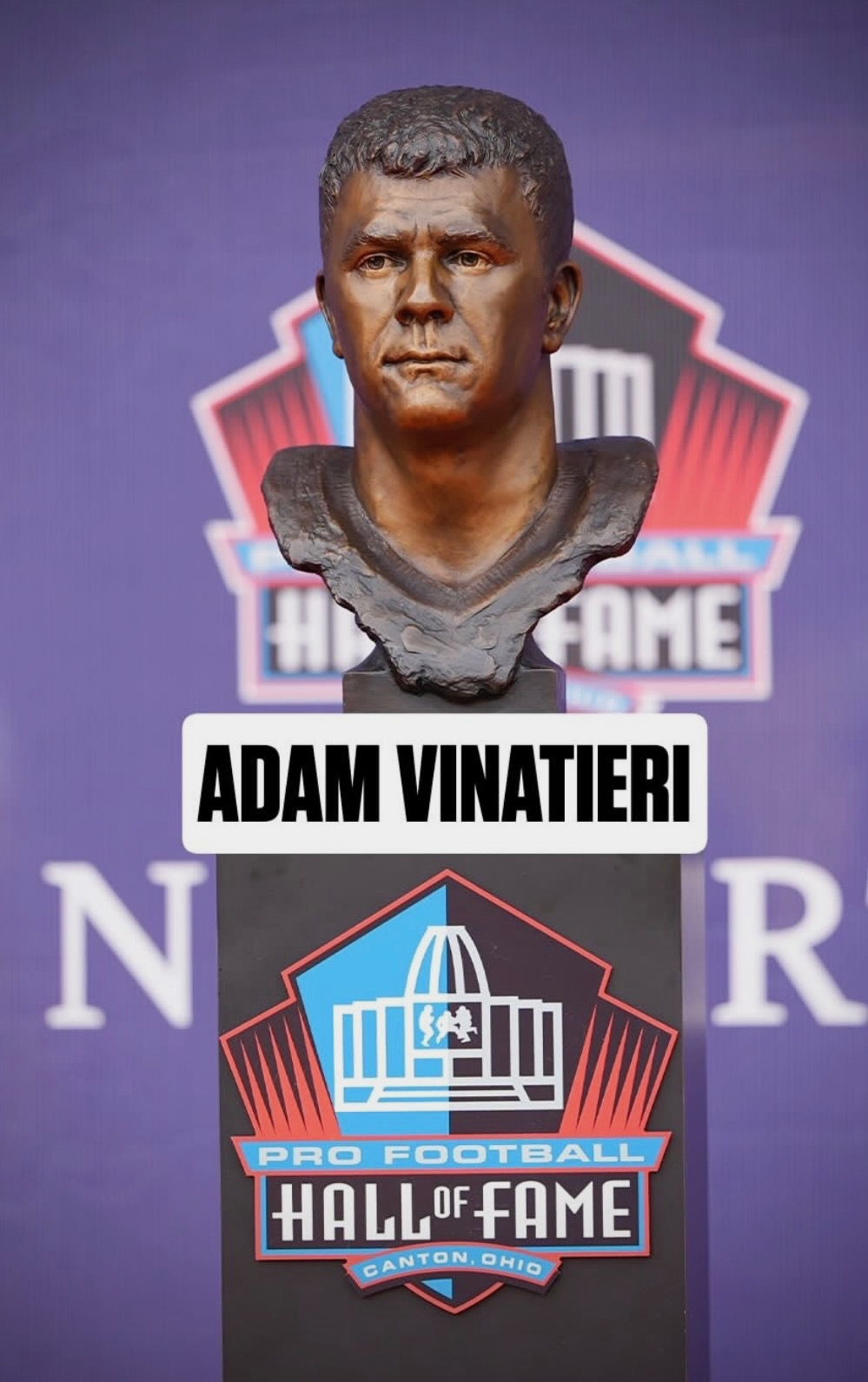 Adam Vinatieri portrait bust displayed on its named Pro Football Hall of Fame pedestal